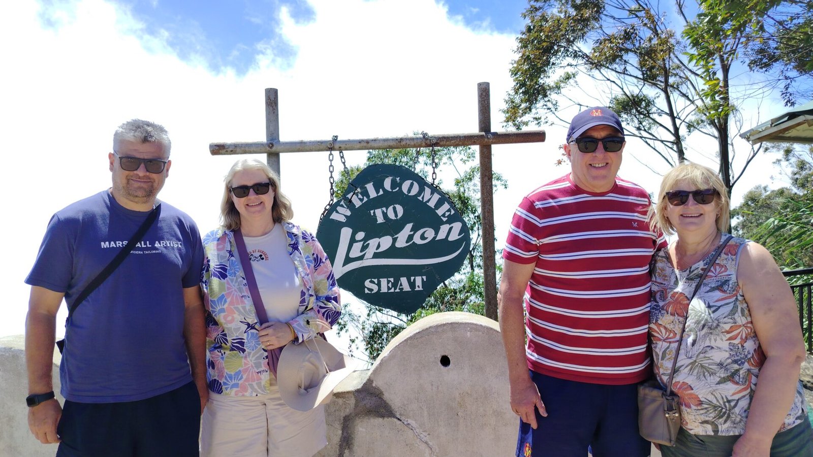 Happy travelers enjoying a wildlife safari tour in Sri Lanka